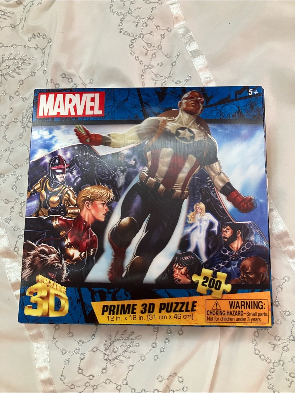 Marvel 3D Puzzle with Red, Blue, White Artwork Featuring Superheroes